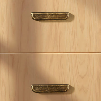 Antique bronze recessed cabinet pull, shown from one angle installed on cabinetry in context