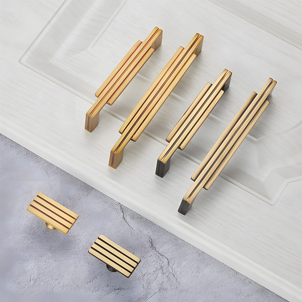 Art Deco brass cabinet pull and knob, pictured in one view as a color and finish lineup