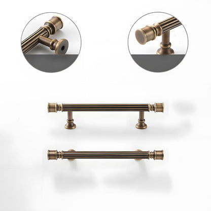 Art Deco fluted brass pulls, knobs, and ring pulls, shown at close range with its construction and finish visible