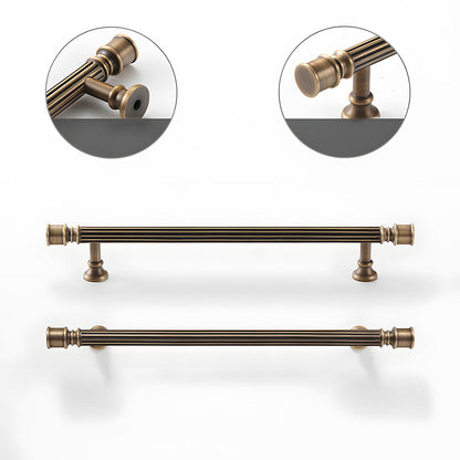 Art Deco fluted brass pulls, knobs, and ring pulls, shown in a focused view with its construction and finish visible
