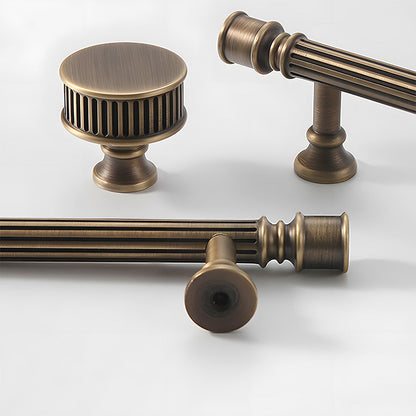 Art Deco fluted brass pulls, knobs, and ring pulls, shown clearly with its construction and finish visible