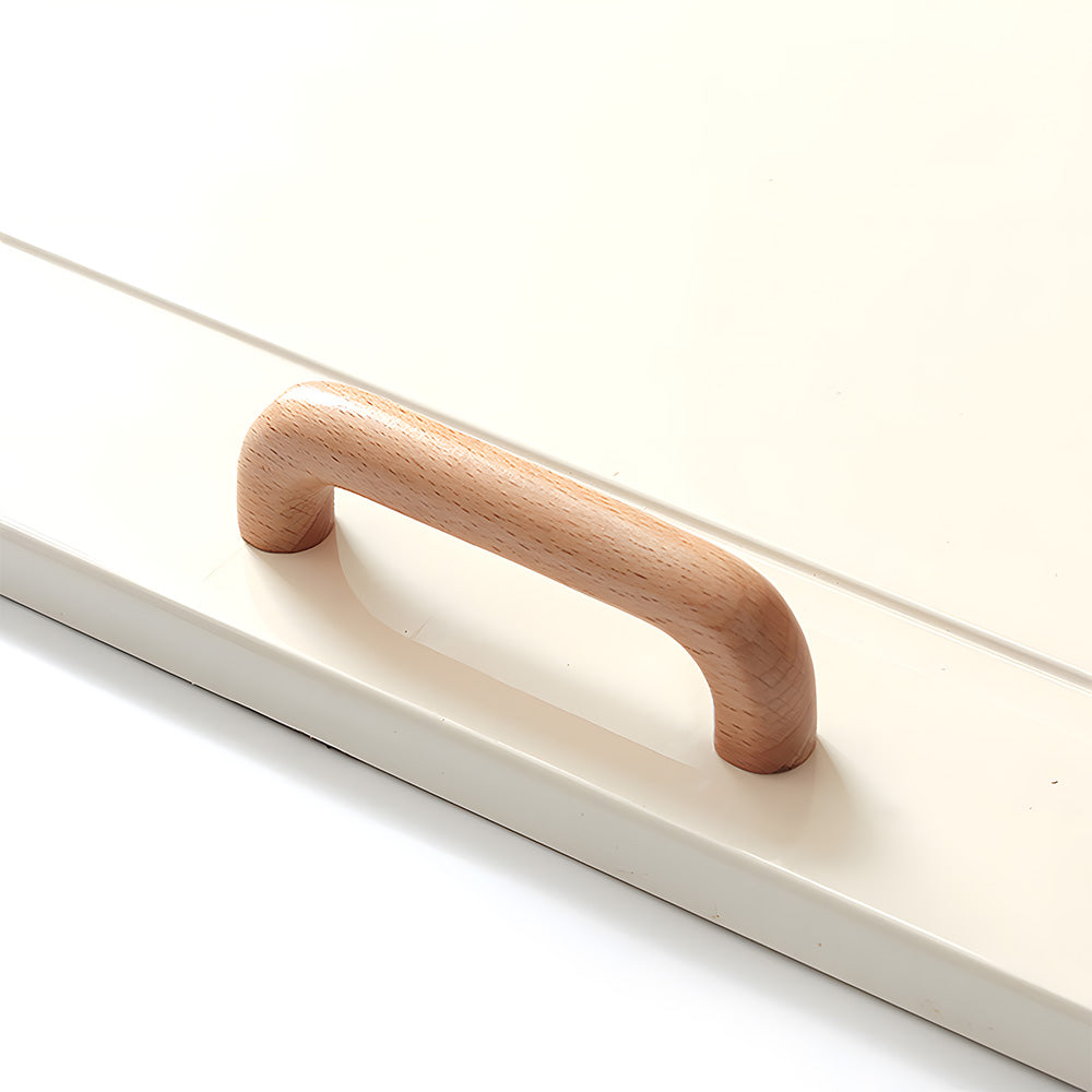 Beech wood cabinet pull with rounded ends, shown from a close side angle against a plain surface