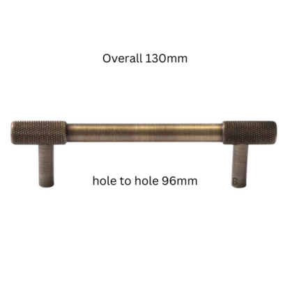 Knurled T-bar cabinet pull and round knob, shown in a focused view with dimensions and centers labeled