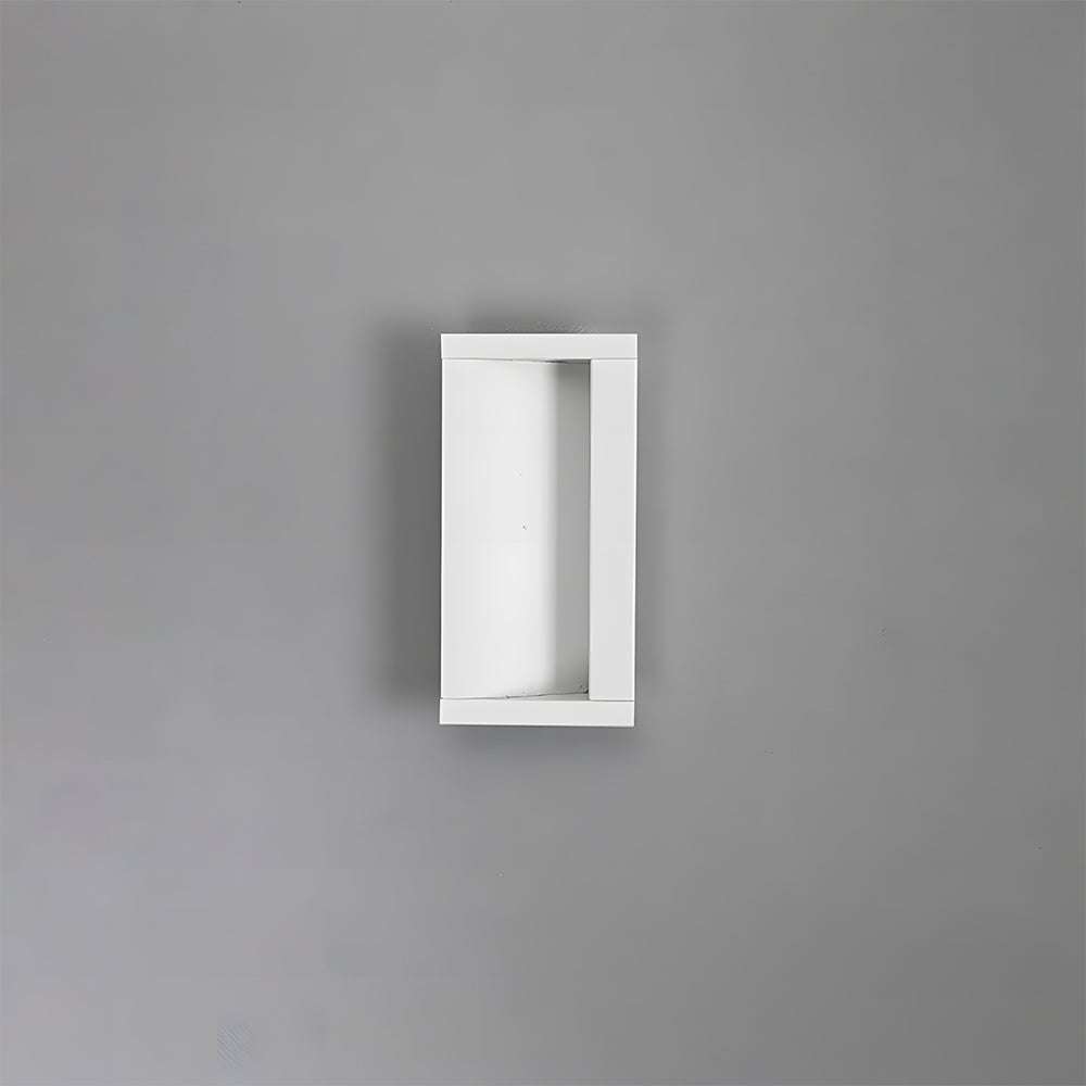 White aluminum recessed cabinet pull with 64 mm hole centers installed vertically on a gray door