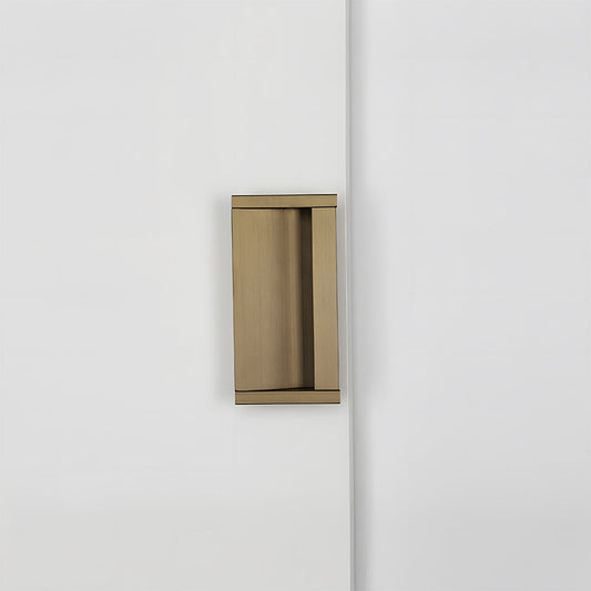 Bronze aluminum recessed cabinet pull with 64 mm hole centers in a straight-on vertical view