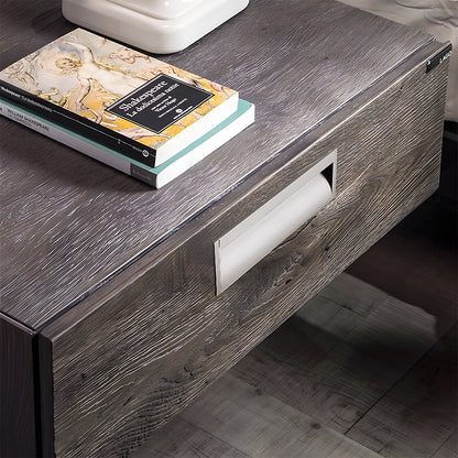 Silver aluminum recessed cabinet pull with 128 mm hole centers installed on a wood-grain drawer