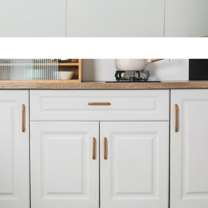 Curved wood cabinet pull and knob in natural wood with 128 mm centers, installed on kitchen cabinet doors and drawers