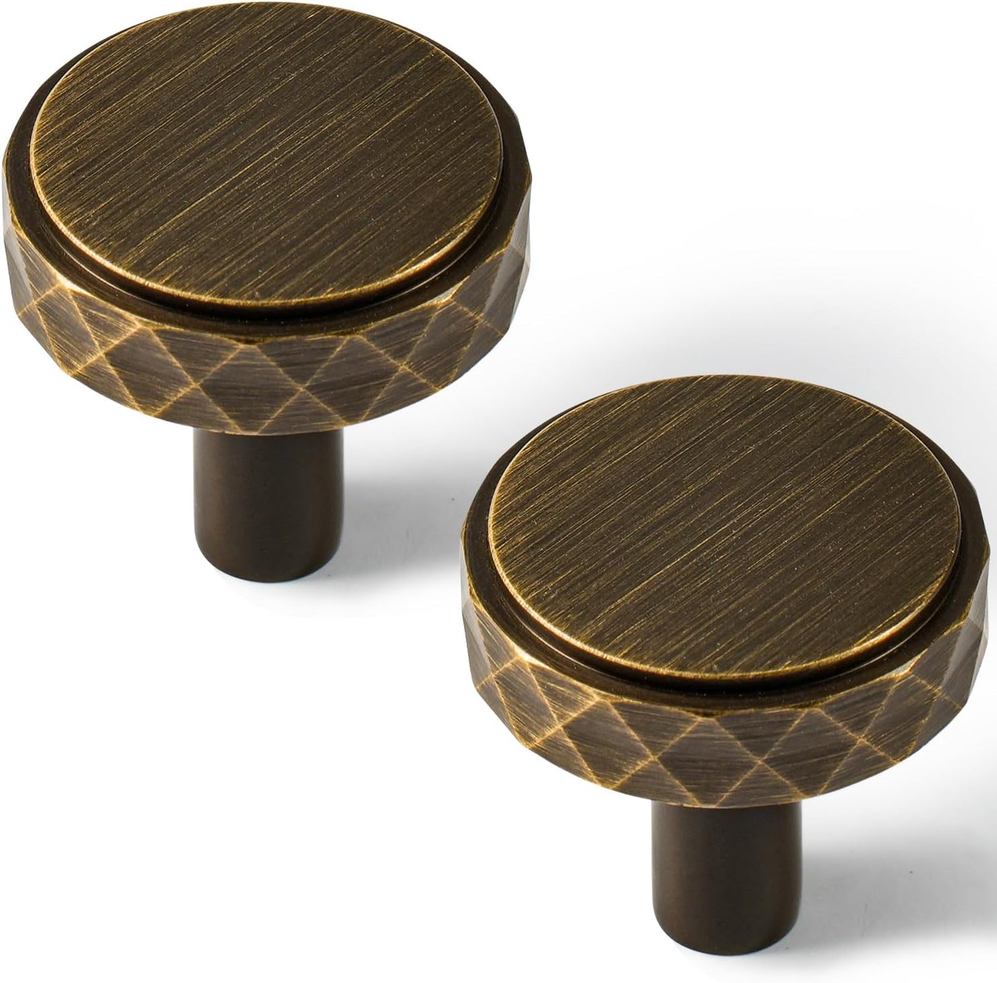 Faceted brass cabinet pull and round knob, shown clearly in an installed cabinet close-up