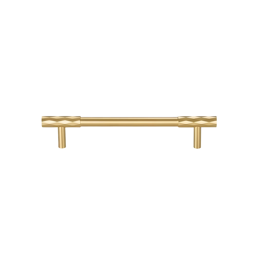 Faceted brass cabinet pull and round knob, shown at close range on a clean neutral background