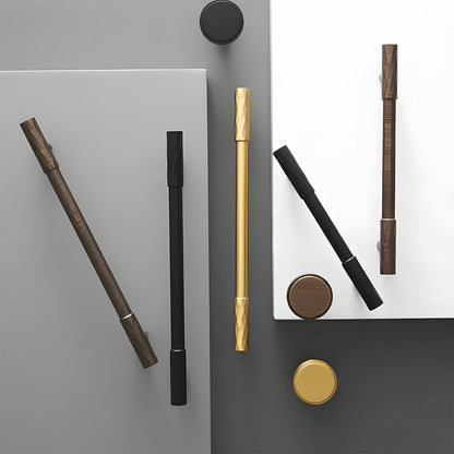Faceted brass cabinet pull and round knob, shown from one angle as a color and finish lineup