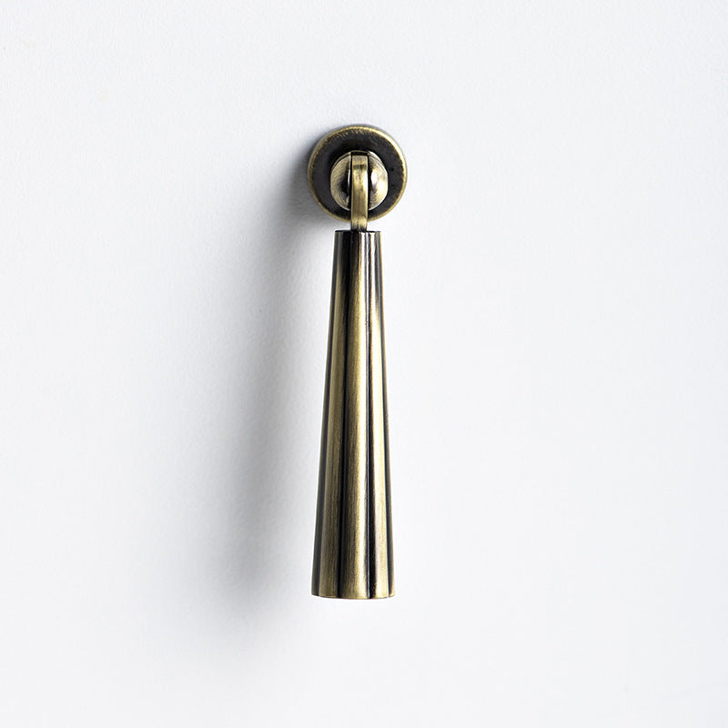 Antique bronze fluted pendant drop pull, shown clearly on a clean neutral background