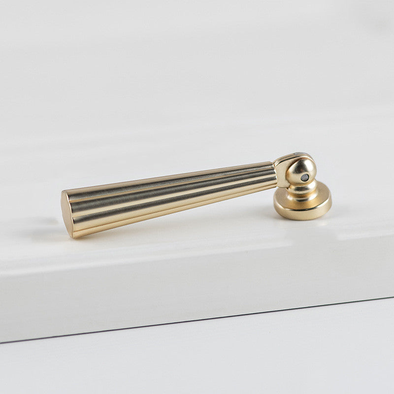 Brushed gold fluted pendant drop pull, shown clearly with its construction and finish visible