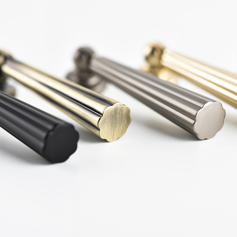 Fluted pendant drop pull, shown from one angle as a color and finish lineup with key hardware details visible