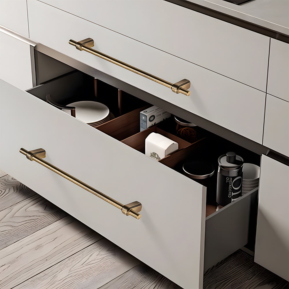 French brass round bar cabinet pull with block mounts, shown at close range installed on cabinetry in context