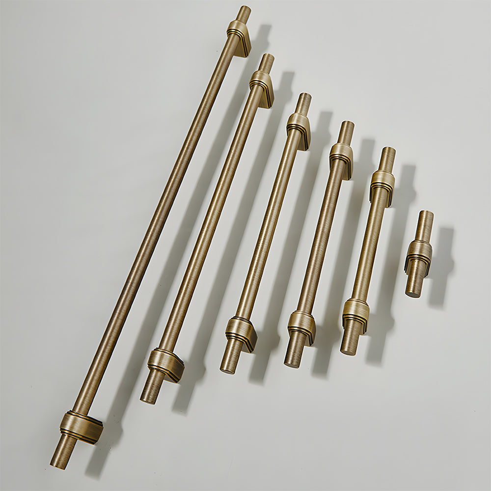 French brass round bar cabinet pull with block mounts, shown from one angle as a color and finish lineup