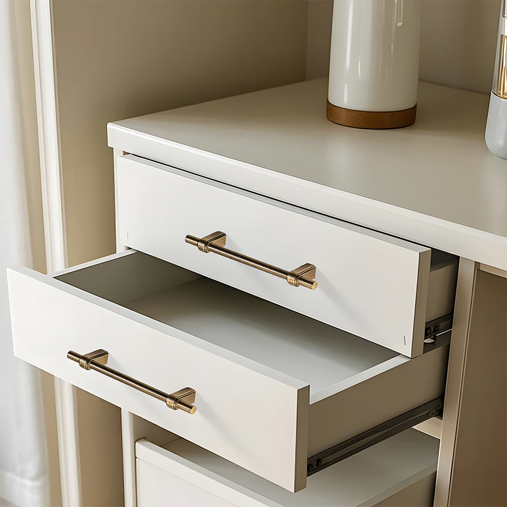 French brass round bar cabinet pull with block mounts, shown clearly installed on cabinetry in context