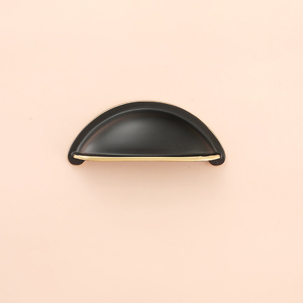 Half-round brass cabinet cup pull, displayed from the side on a clean neutral background
