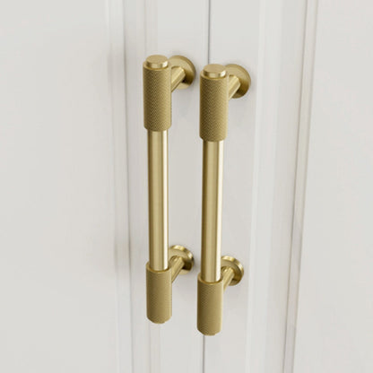 Knurled brass round bar cabinet pull, shown clearly in an installed cabinet close-up