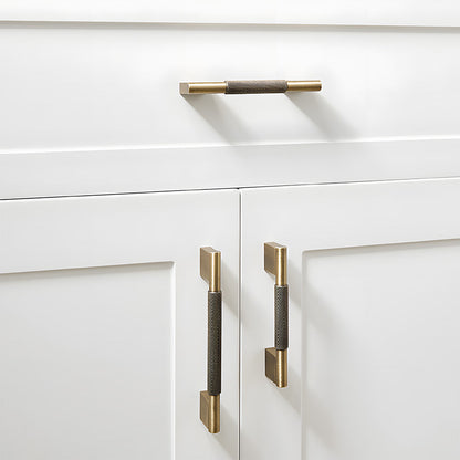 Knurled brass cabinet pull with rectangular mounts and knob, presented in another view installed on cabinetry in context