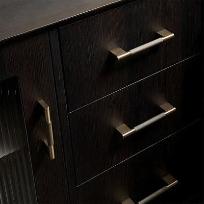 Knurled brass cabinet pull with rectangular mounts and knob, displayed from the side installed on cabinetry in context