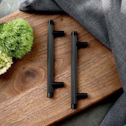 Knurled T-bar cabinet pull, pictured in one view as a color and finish lineup with key hardware details visible