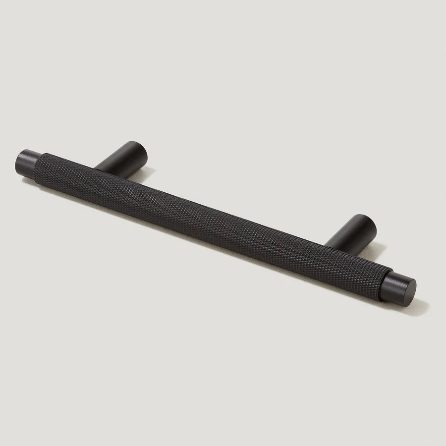 Knurled T-bar cabinet pull, displayed from the side on a clean neutral background