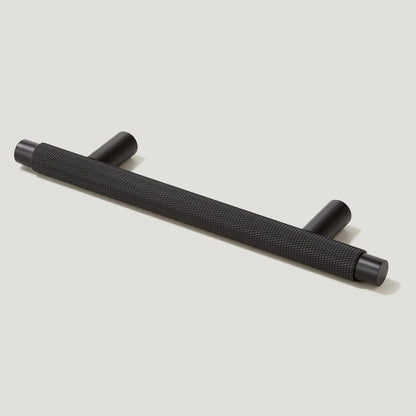 Knurled T-bar cabinet pull, displayed from the side on a clean neutral background