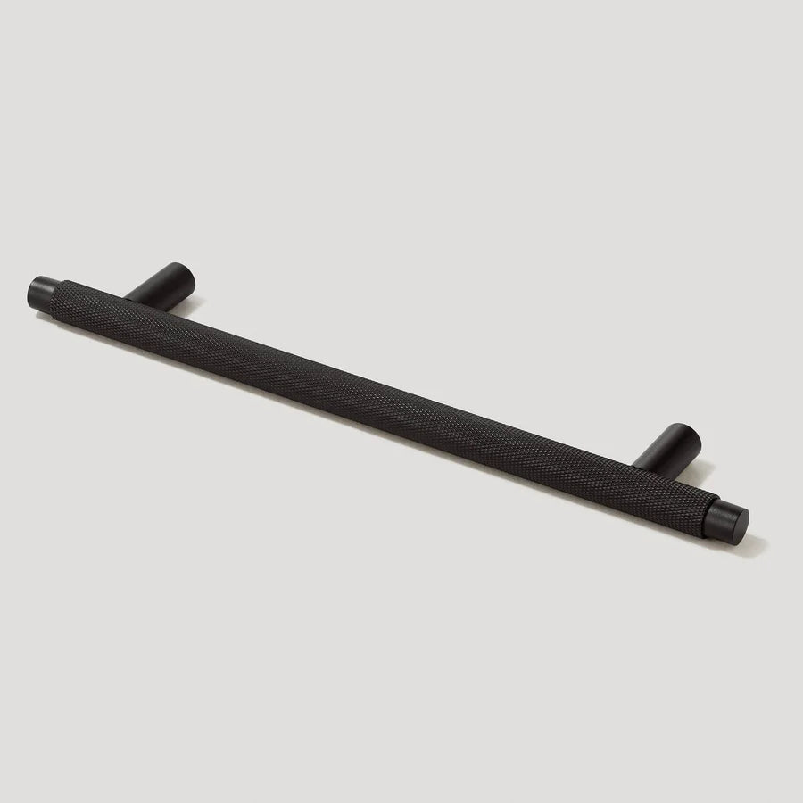 Knurled T-bar cabinet pull, shown in a focused view on a clean neutral background