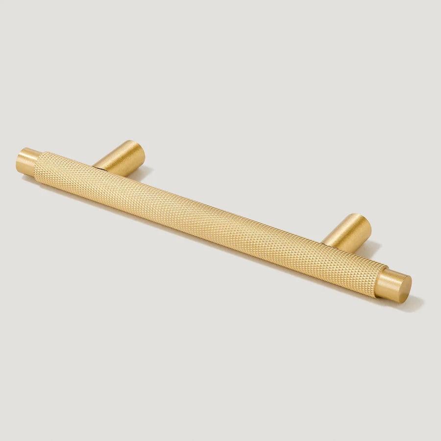 Knurled T-bar cabinet pull, shown from one angle on a clean neutral background with key hardware details visible