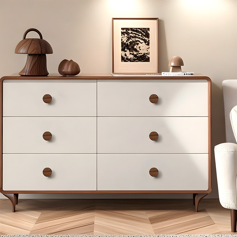 Low-profile walnut cabinet pull, installed on a dresser or sideboard in a wider view