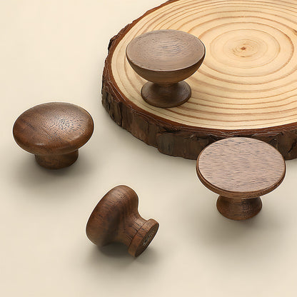 Walnut wood cabinet knob with a rounded face, shown alone on a light background, with its short base visible