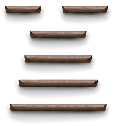Minimalist walnut wood cabinet pull with a low curved profile, shown in a straight lineup comparing available lengths