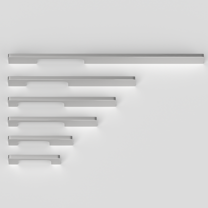 Brushed nickel slim rectangular aluminum cabinet pull, pictured in one view as a color and finish lineup