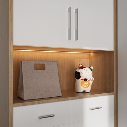 Brushed nickel slim rectangular aluminum cabinet pull, presented in another view installed on cabinetry in context