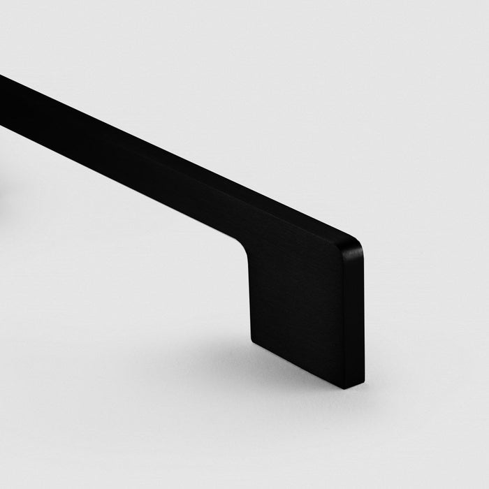Slim rectangular aluminum cabinet pull, shown clearly with its construction and finish visible
