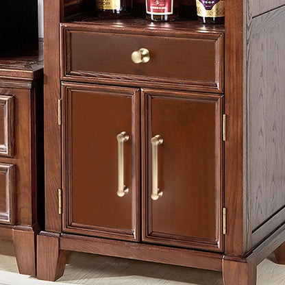 Traditional cabinet pull with flared mounts and knob, pictured in one view installed on cabinetry in context