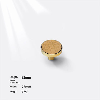 Natural wood inlay cabinet knob with a rounded metal frame, shown installed on a cabinet front