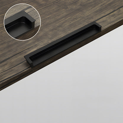 Concealed slotted cabinet pull, shown at close range with its construction and finish visible
