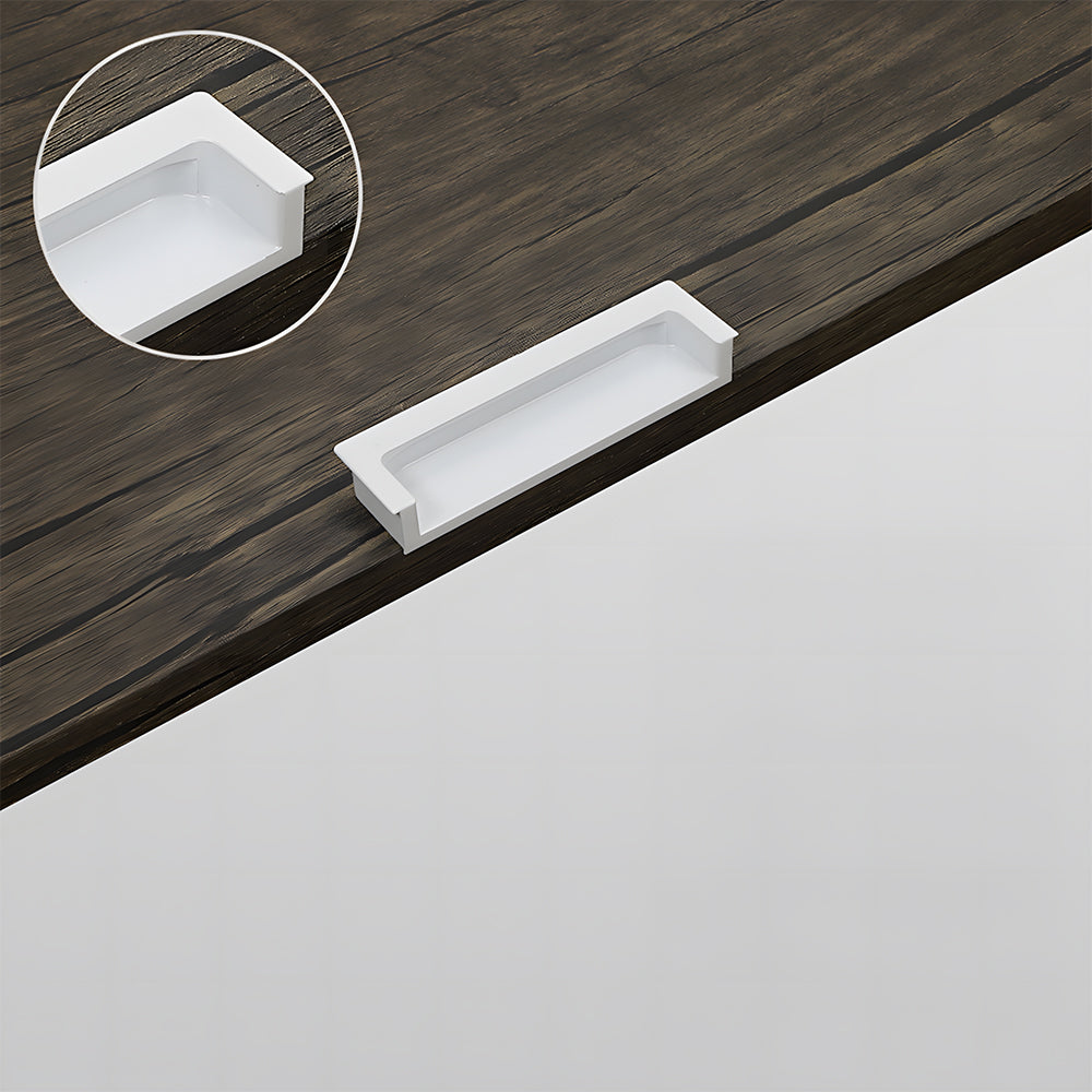 Concealed slotted cabinet pull, pictured in one view showing the surface and mounting form