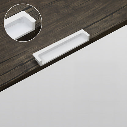 Concealed slotted cabinet pull, presented for reference showing the surface and mounting form