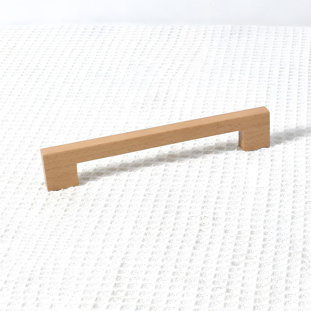 Square wood cabinet pull in beech with 160 mm centers, shown as a single product on a white background