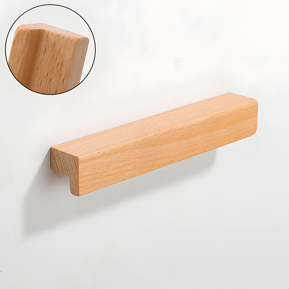 Natural wood cabinet handle with an L-shaped profile, shown alone in a clean front view on a pale background