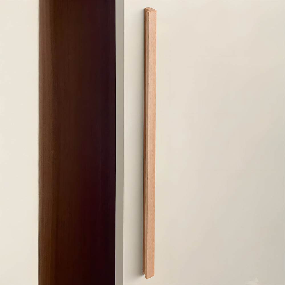 L-shaped wood cabinet handle in style A with 768 mm centers, installed on light cabinet doors with the profile visible