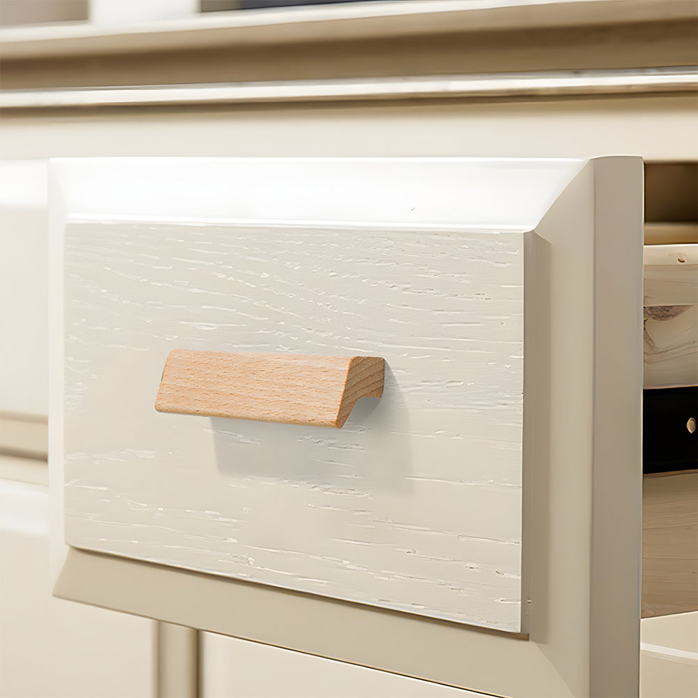 L-shaped wood cabinet handle in style B with 64 mm centers, shown across several drawer fronts in a cabinet scene