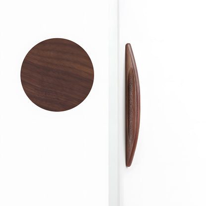 Tapered wood cabinet pull in black walnut with 128 mm centers, shown from a low angle with the wood face visible