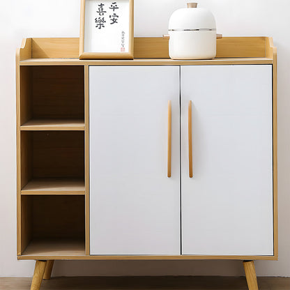 Tapered wood cabinet pull in natural wood with 128 mm centers, shown across a complete storage cabinet in a room setting