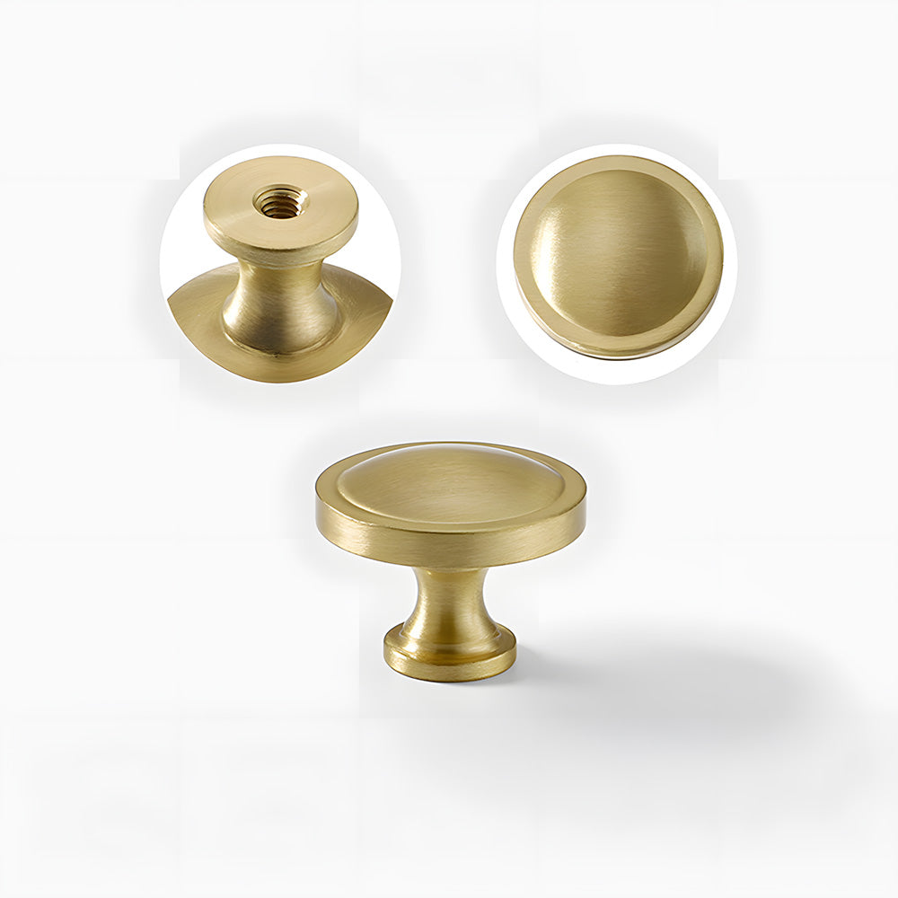 Recessed brass drawer pull with matching cabinet knob, shown clearly with its construction and finish visible