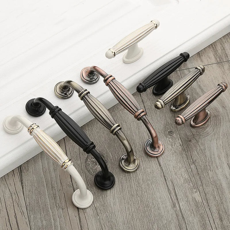 Retro fluted cabinet pull with matching T-bar knob, presented for reference as a color and finish lineup
