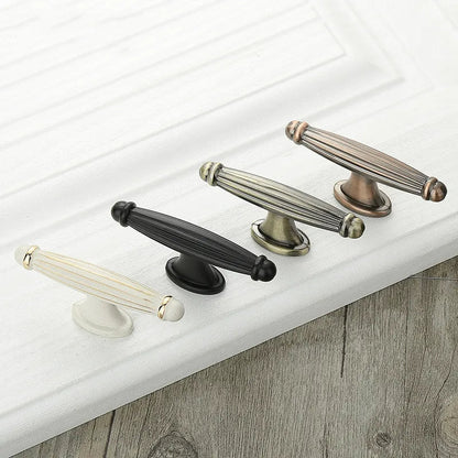 Retro fluted cabinet pull with matching T-bar knob, shown at close range as a color and finish lineup