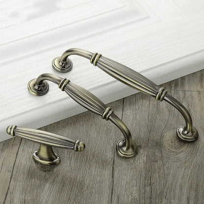 Retro fluted cabinet pull with matching T-bar knob, shown in a focused view as a color and finish lineup